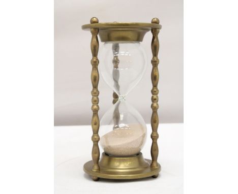 A VINTAGE BRASS HOURGLASS SAND TIMER