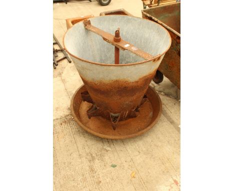 A LARGE GALVANISED AND CAST IRON FEEDER TROUGH PLANTER