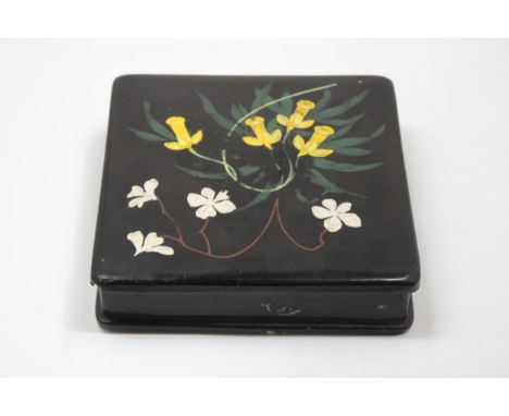 A VINTAGE JAPANESE LACQUERED PAINTING BOX WITH HANDPAINTED DAFFODIL DESIGN