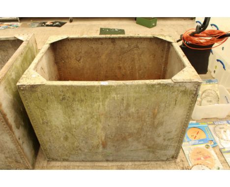 A LARGE VINTAGE GALVANISED RIVETED TROUGH