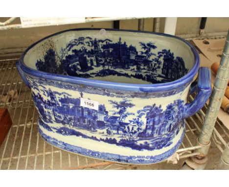 A LARGE DECORATIVE BLUE AND WHITE CERAMIC PLANTER