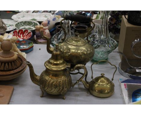 A BRASS SPIRIT KETTLE, SMALL KETTLE AND A TEAPOT
