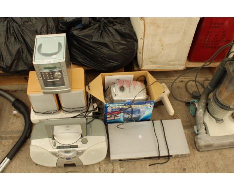 AN ASSORTMENT OF ITEMS TO INCLUDE A SANYO STEREO SYSTEM WITH TWO SPEAKERS, A PHILIPS RADIO AND A CD ALARM CLOCK ETC