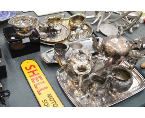 A LARGE QUANTITY OF SILVERPLATE TO INCLUDE TRAY, TEAPOT, COFFEEPOT, MILK, SUGAR, CANDLESTICK, ETC.,