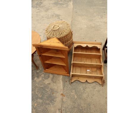 A PINE THREE TIER WALL SHELF, 21.5" WIDE, A SMALL PINE OPEN CORNER SHELF AND A WICKER LAUNDRY BASKET