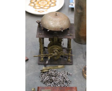 A VINTAGE BRASS STRIKING LANTERN CLOCK