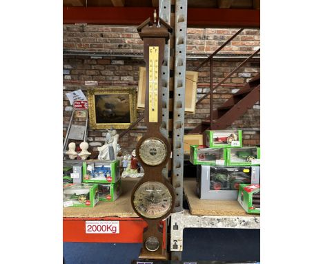 A TREEN WALL BAROMETER APPROXIMATELY 87CM