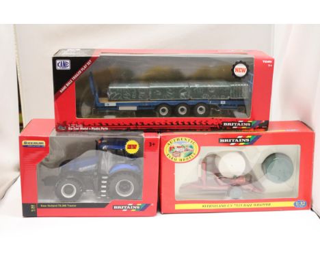 THREE BRITAINS 1:32 SCALE MODELS TO INCLUDE A NEW HOLLAND T8.390 TRACTOR, A KANE BALE TRAILER AND A BALE WRAPPER - ALL AS NEW