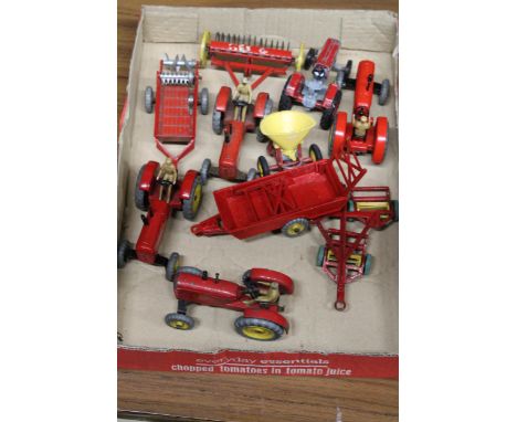 A COLLECTION OF VINTAGE DINKY TOYS TO INCLUDE FOUR MASSEY-HARRIS TRACTORS, A MASSEY FERGUSON 165 TRACTOR AND FIVE FARMING IMP