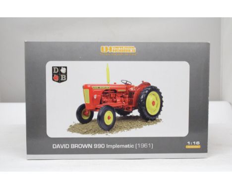 A UNIVERSAL HOBBIES MODEL, ITEM NO. 4006, DAVID BROWN 990 IMPLEMATIC (1961), COLLECTORS MODEL TRACTOR - AS NEW IN BOX