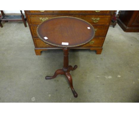 A mahogany tripod wine table 