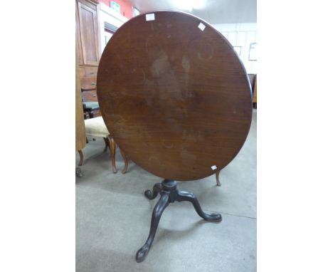 A George IV mahogany circular tilt top tripod tea table 