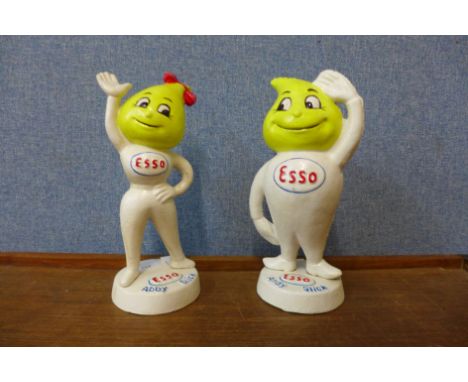 A pair of reproduction cast metal Esso oil Andy Slick and Abby Slick money boxes 