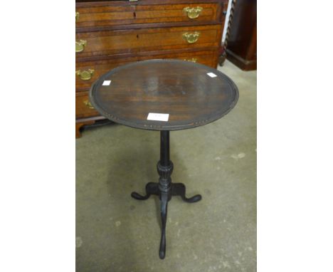 A mahogany tripod wine table 