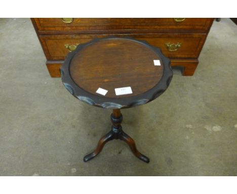 A mahogany tripod wine table 