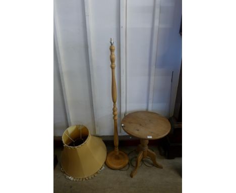 A pine standard lamp and a pine tripod table 