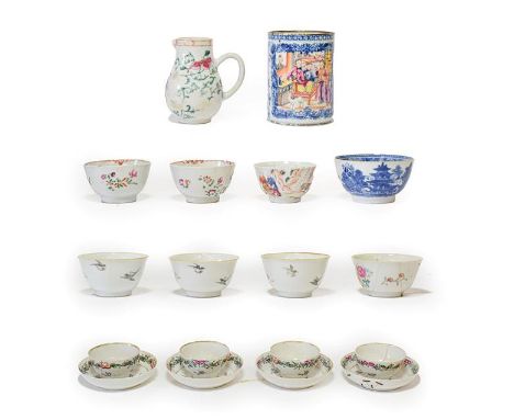 A Pair of Chinese Porcelain Tea Bowls and Four Saucers, Qianlong, painted in famille rose enamels with flowersprays; A Simila