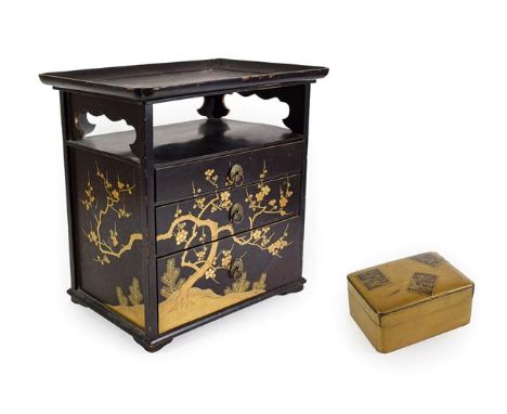 A Japanese Lacquer Table Cabinet, late, with tray top over a shelf and three graduated drawers on bracket feet, the whole gil