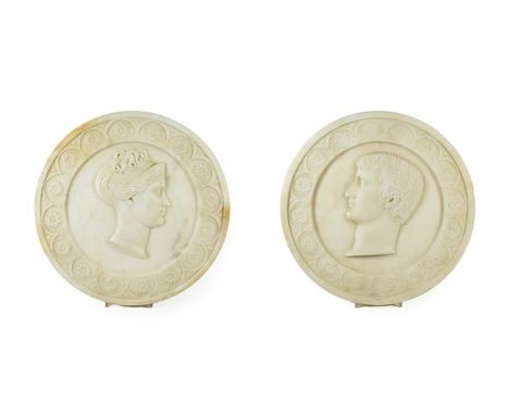 A Pair of Marble Relief Portrait Roundels of Napoleon and Empress Josephine, 19th century, carved in relief within arcaded ro