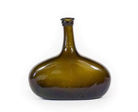 A Green Glass Side-Flattened Bottle, probably Low Countries or Germany, mid 18th century, with string ring, 18cm high CONDITI