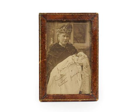 A Photographic Reproduction Portrait of Queen Mary, holding her Grandson George Lascelles, signed, inscribed and dated 1923 b