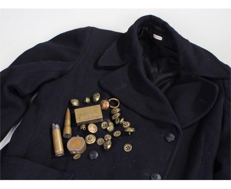 Naval jacket, together with a collection of Royal Artillery buttons, a trench art match box cover and a lighter, (qty)