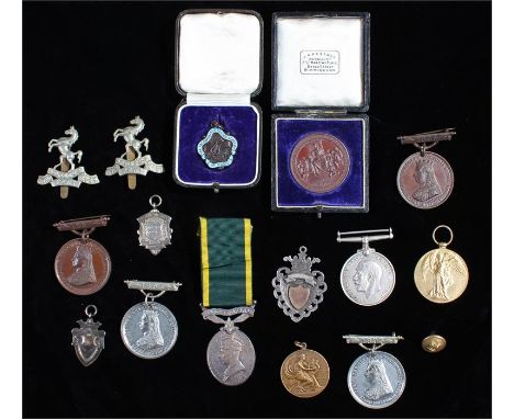 Family group, to include a First World War pair (G-15966 PTE. R.J. MOODY R.W. KENT.) a Territorial Efficient Service medal (2