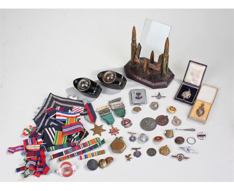 Militaria, to include a bullet picture stand, two compasses, various medals and medallions, (qty)