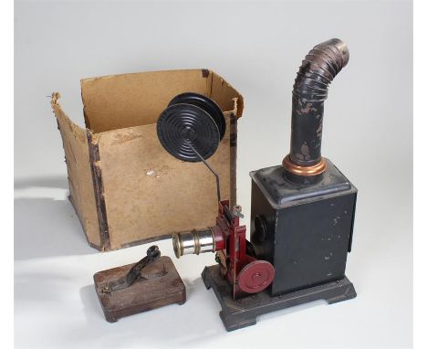 Ernst Plank Magic Lantern slide projector, in black and red with projecting lens