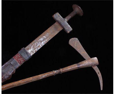 19th Century Sudanese sword, with scabbard, together with an axe, (2)