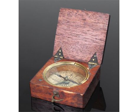 19th Century compass, the mahogany case housing a paper compass and blued steel gnomen, 5.5cm wide