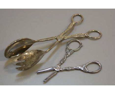 A pair of silver plated serving spoons and a pair of Danish white metal grape scissors (2), £10-20