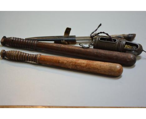 A hardwood truncheon with pierced ringed handle and a treen carved truncheon, a deer hoof handled knife and a painted alumini