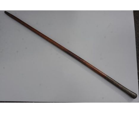 A Eastern malacca copper and brass inlaid walking stick with diamond inlaid panels (l.93cm), £60-80