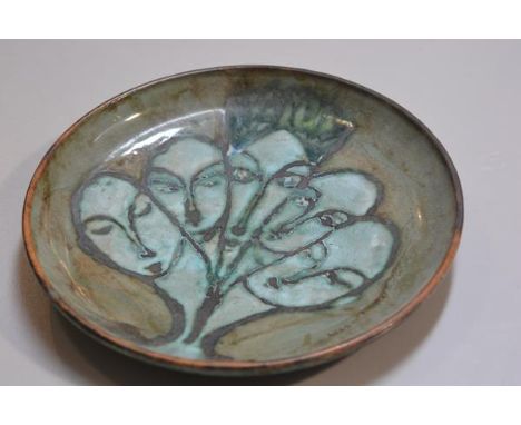 Carolina Valvona, a circular dish with incised jade green glazed heads decoration (d.33cm), £20-40