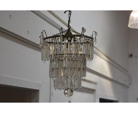 A 19thc three tier crystal faceted waterfall pendant light fitting with crystal faceted ball and drops (l. 47cm), £150-200