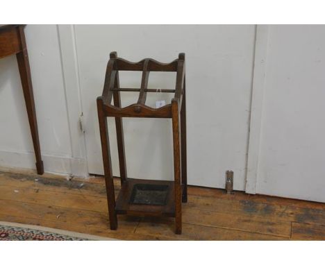 A 1920s oak four division stick stand on square supports, complete with drip tray (h.78cm), £20-30