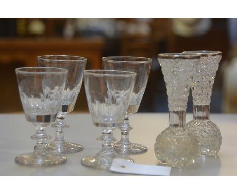 A set of four 19thc crystal thumb cut cordial glasses with knop stems (h.11cm) and a pair of crystal silver mounted bud vases