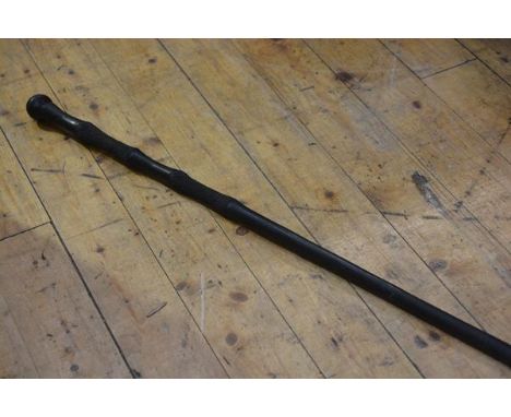 An African carved ebonised walking stick with pommel handle (l. 100cm), £20-40