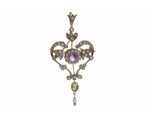 EDWARDIAN SEED PEARL SET BROOCH PENDANTof sinuous form, set with graduated split pearls, with a central purple paste, with an