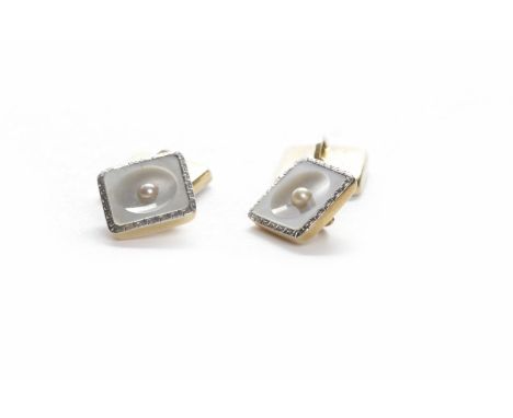 PAIR OF EIGHTEEN CARAT GOLD AND PLATINUM MOTHER OF PEARL SET CUFF LINKSeach of square form and with a seed pearl set mother o
