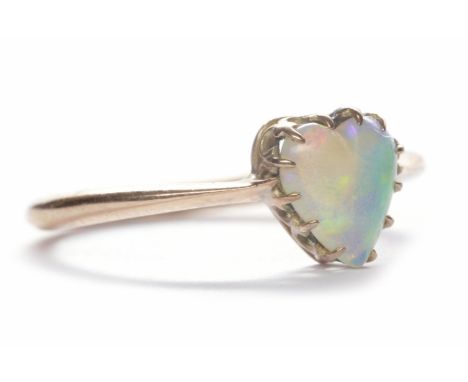 EDWARDIAN OPAL SINGLE STONE RINGthe heart shaped opal 6mm across and set in nine carat gold, size K