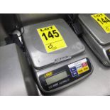 UWE digital scale, mod. GS-6000, ser. no. I1932, 8 in. x 8 in. platform, 6000-1g cap.