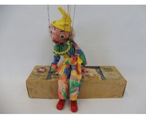 A boxed Pelham puppet 'Clown', late 1950s, very good condition, moving mouth version with original string and box. 