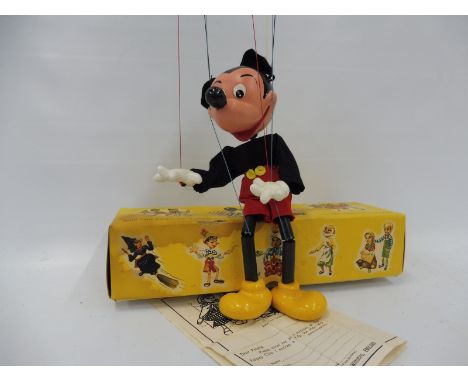 A boxed Pelham puppet 'Mickey Mouse', late 1960s in original box, mid production range with large nose and Disney hands, no m