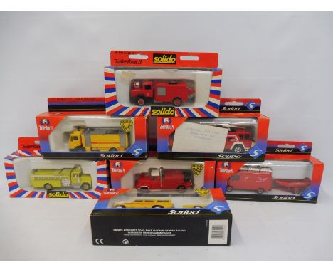 Seven boxed Solido die-cast models, all emergency vehicles including Forest Fire trucks.