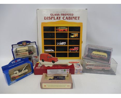 A group of mixed boxed die-cast models plus a boxed wall mounted model shelf. 