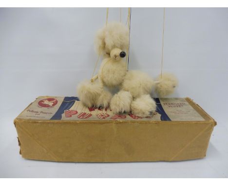 A boxed Pelham puppet 'Poodle', restrung in non-original box.