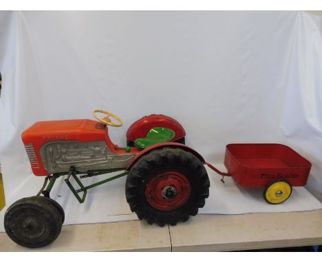 A rare large scale Tri-ang tractor pedal car in the form of a Massey Ferguson 65, plus a Tri-Trailer.