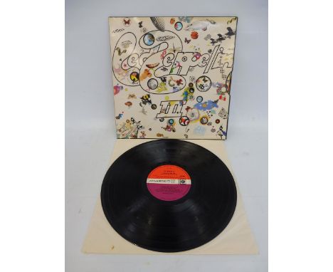 Led Zeppelin 3 first press, purple and maroon label, rotating wheel sleeve in excellent condition, produced by Peter Green, v
